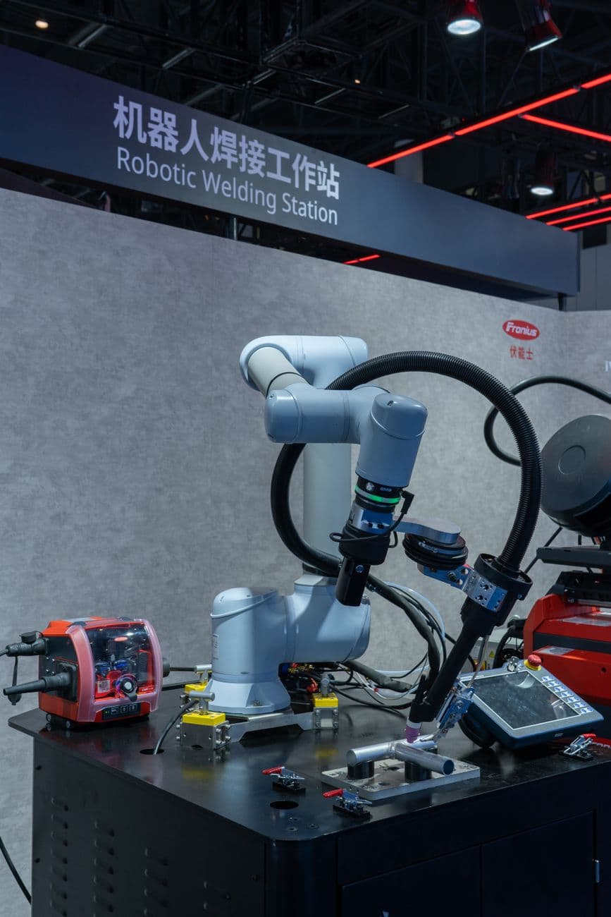 A robotic arm on an automotive assembly line