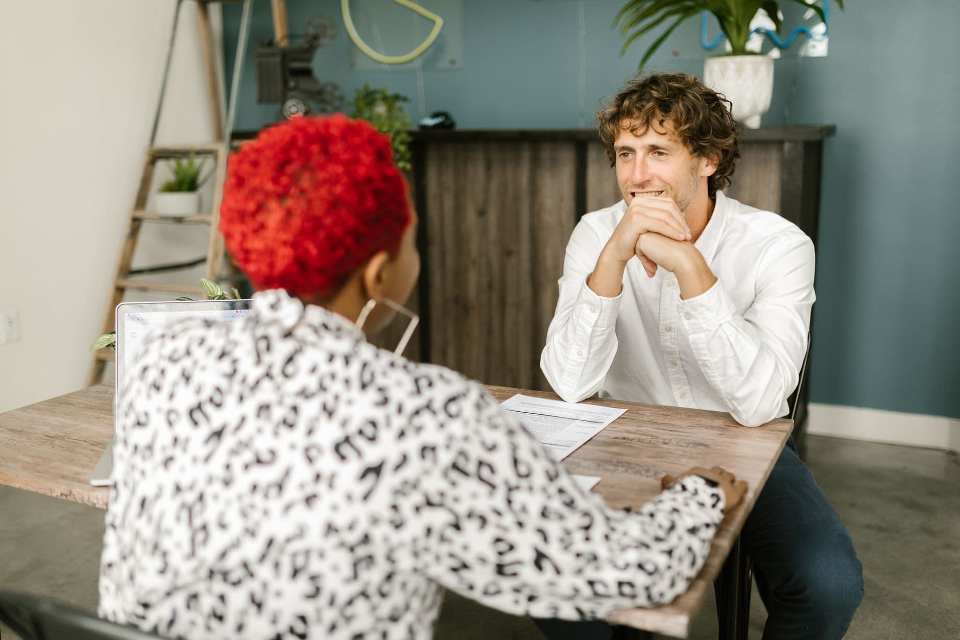 An interview underway across a meeting table